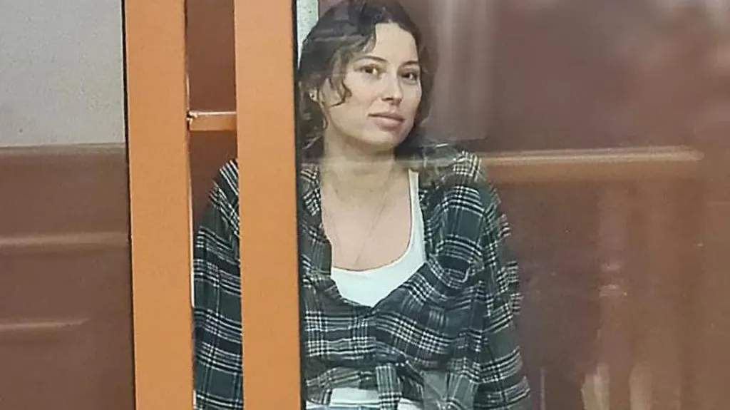 A US-Russian woman has been sentenced to 12 years in prison in Russia for treason.