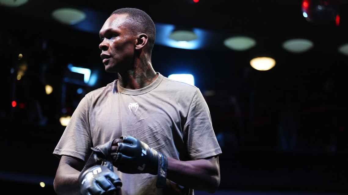 “The familiar Izzy returns with a new edge: Israel Adesanya makes a comeback at UFC 305.”